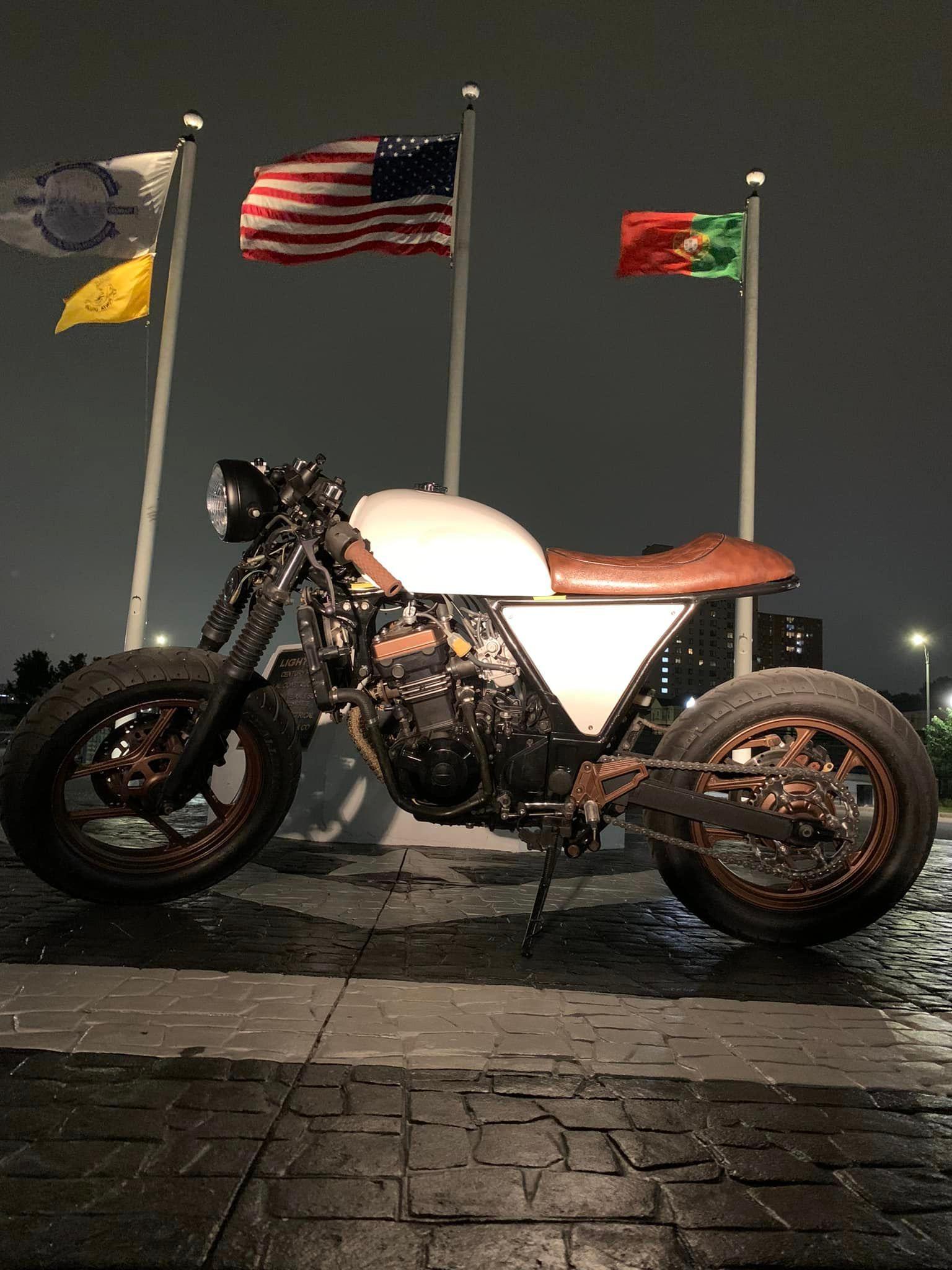 Cafe racer at the memorial with flags